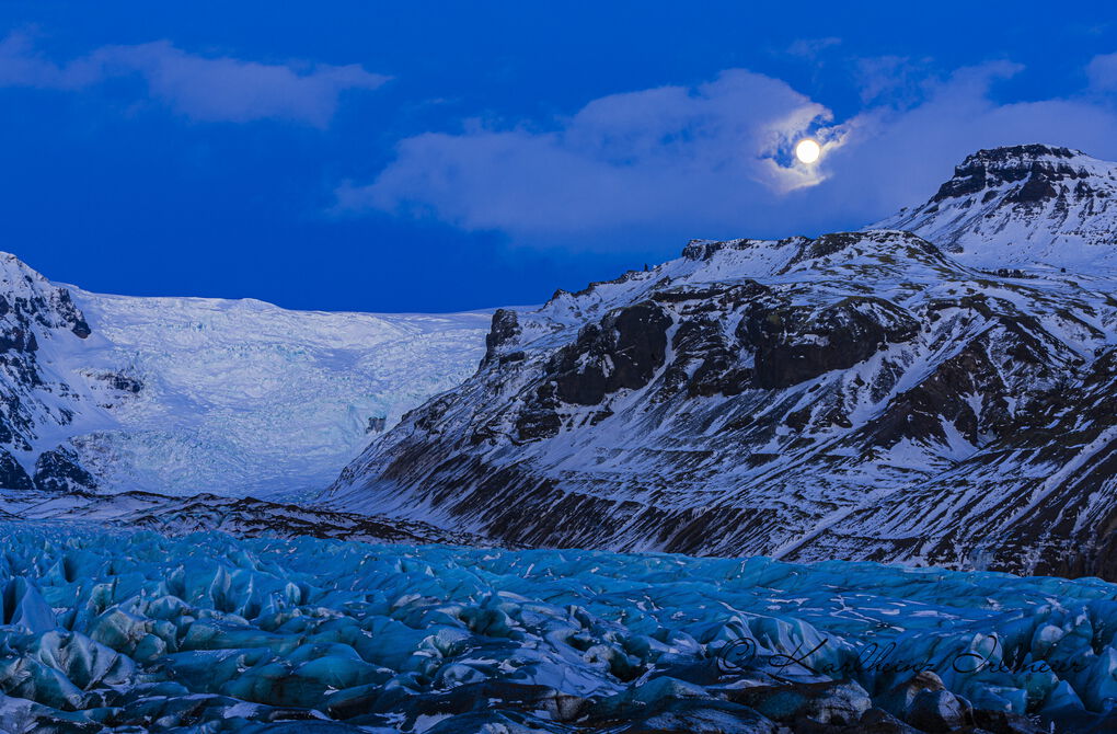 Full moon over Svinafellsjökull, evening mood, Skaftafell national park, south-east Iceland