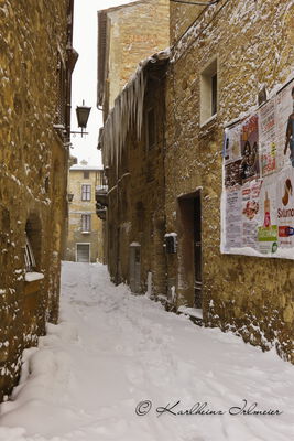 Snow covered road in Pienza, Tuscany