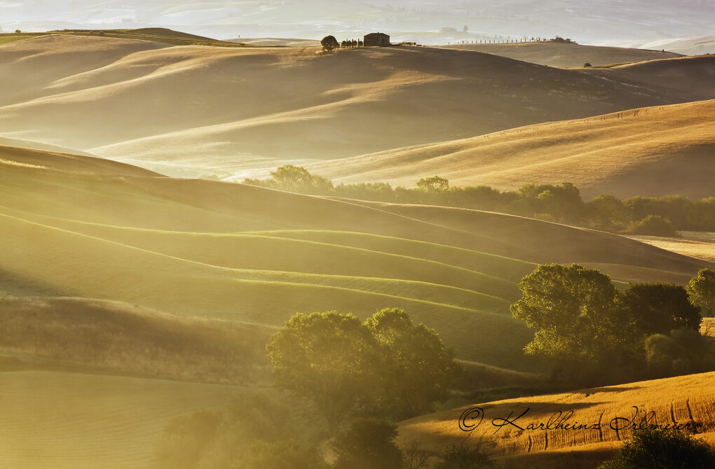 Hilly landscape in the morning mist, Tuscany