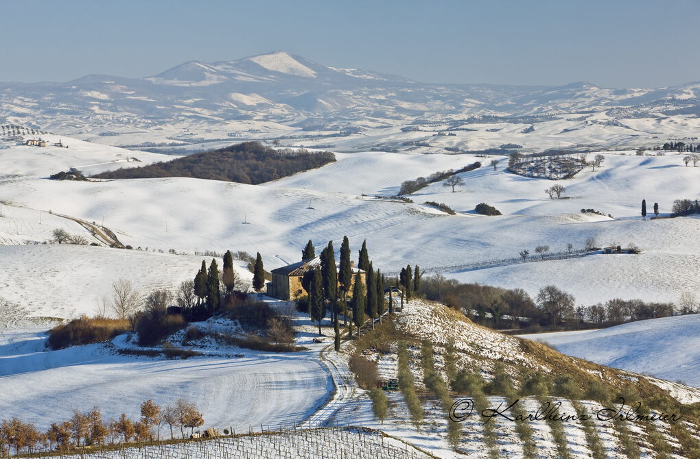 Podere Belvedere in snowy landscape, Tuscany, San Quirico